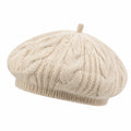 Baskenmütze Einheitsgröße aus Strickmaterial in Creme mit Zopfmuster